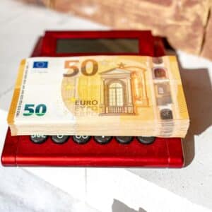 Photo Mobile phone with money icon