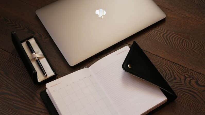 Photo Laptop and textbooks